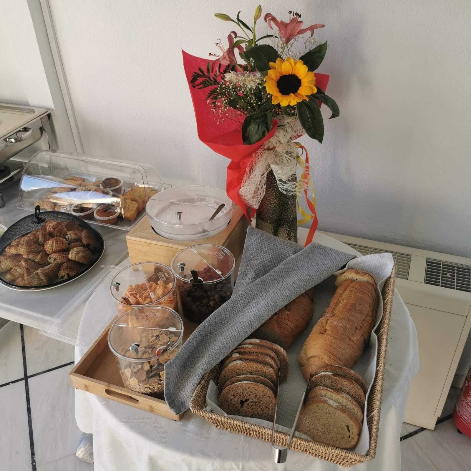 a basket of bread and flowers