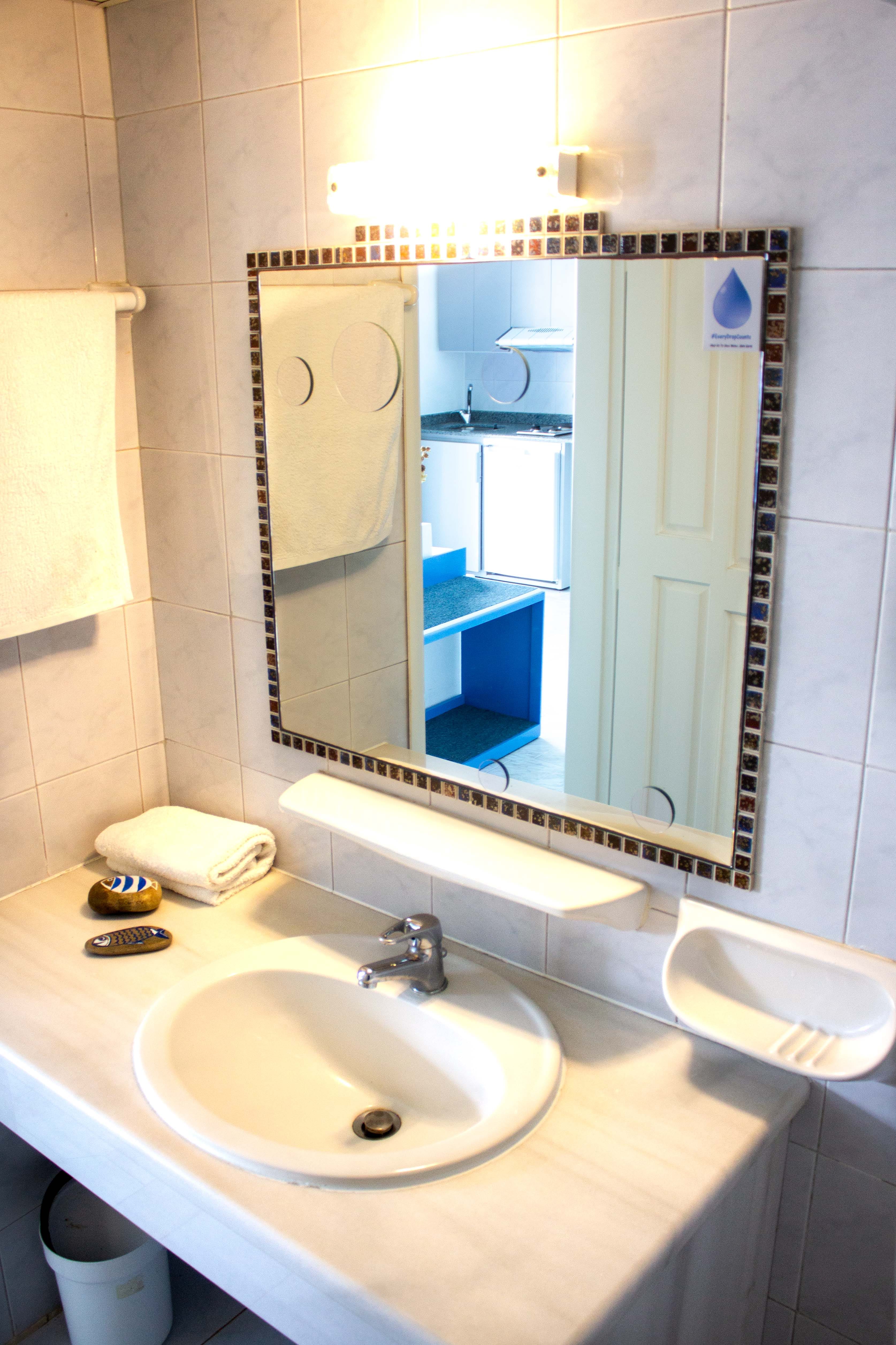 a bathroom with a glass door