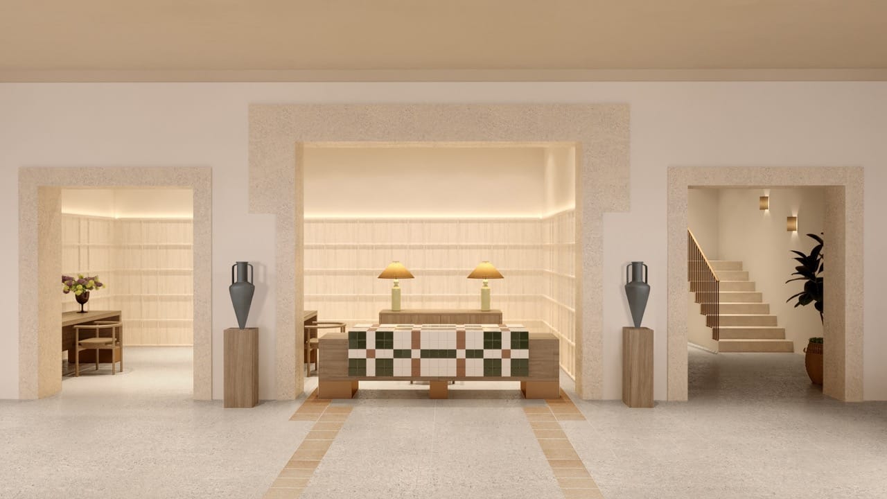 a room with a staircase and a table