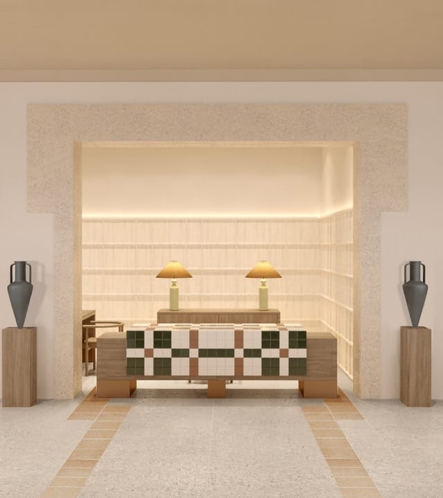 a room with a staircase and a table