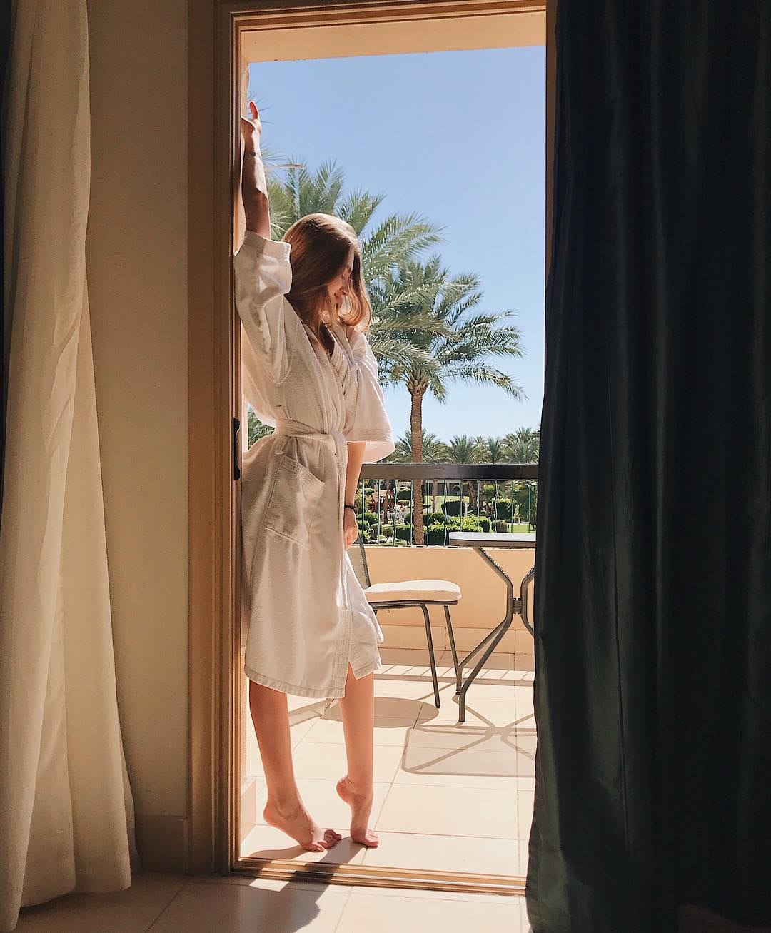 a person looking out a window