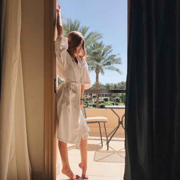 a person looking out a window