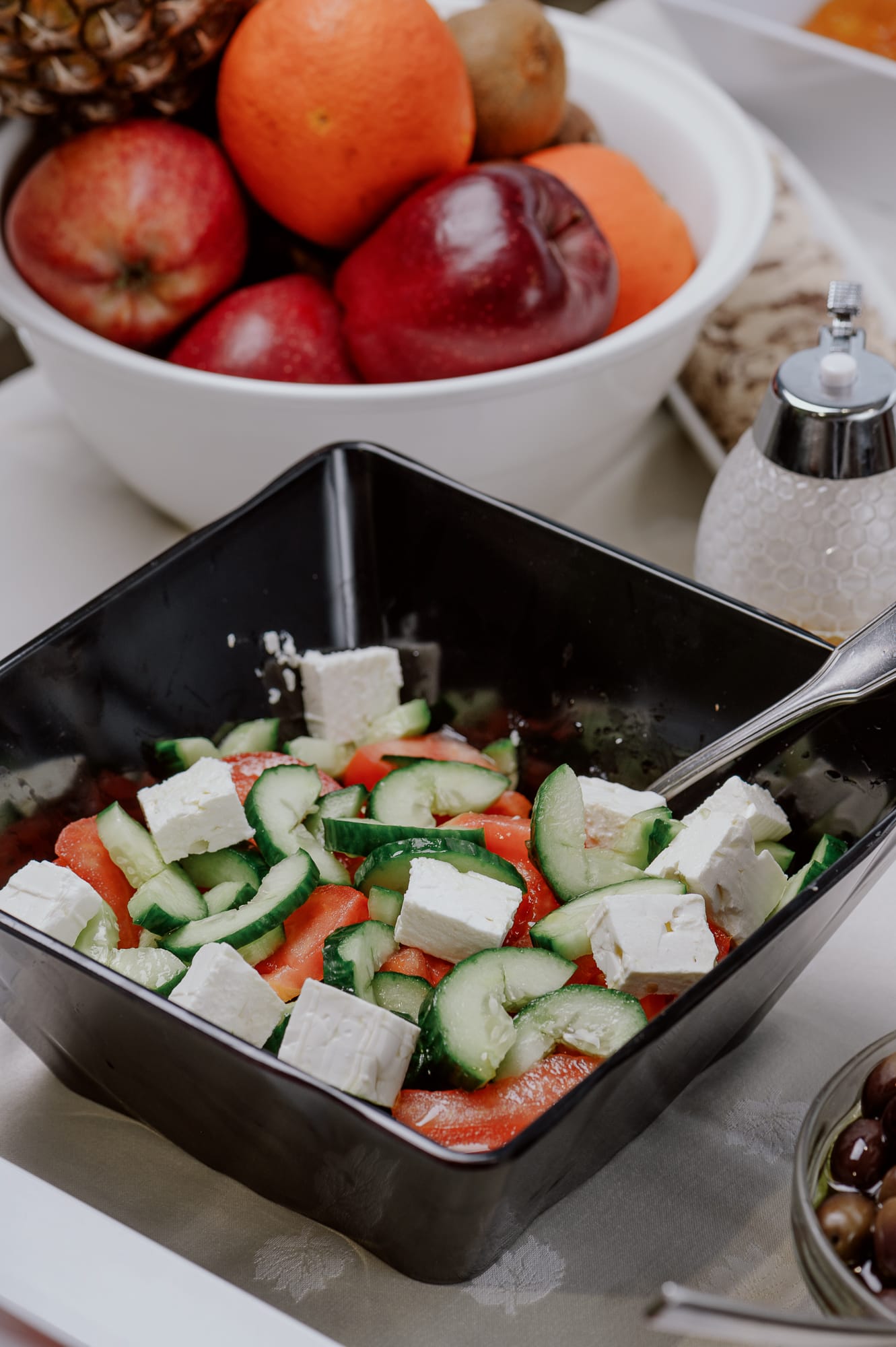 a bowl of vegetables and fruits