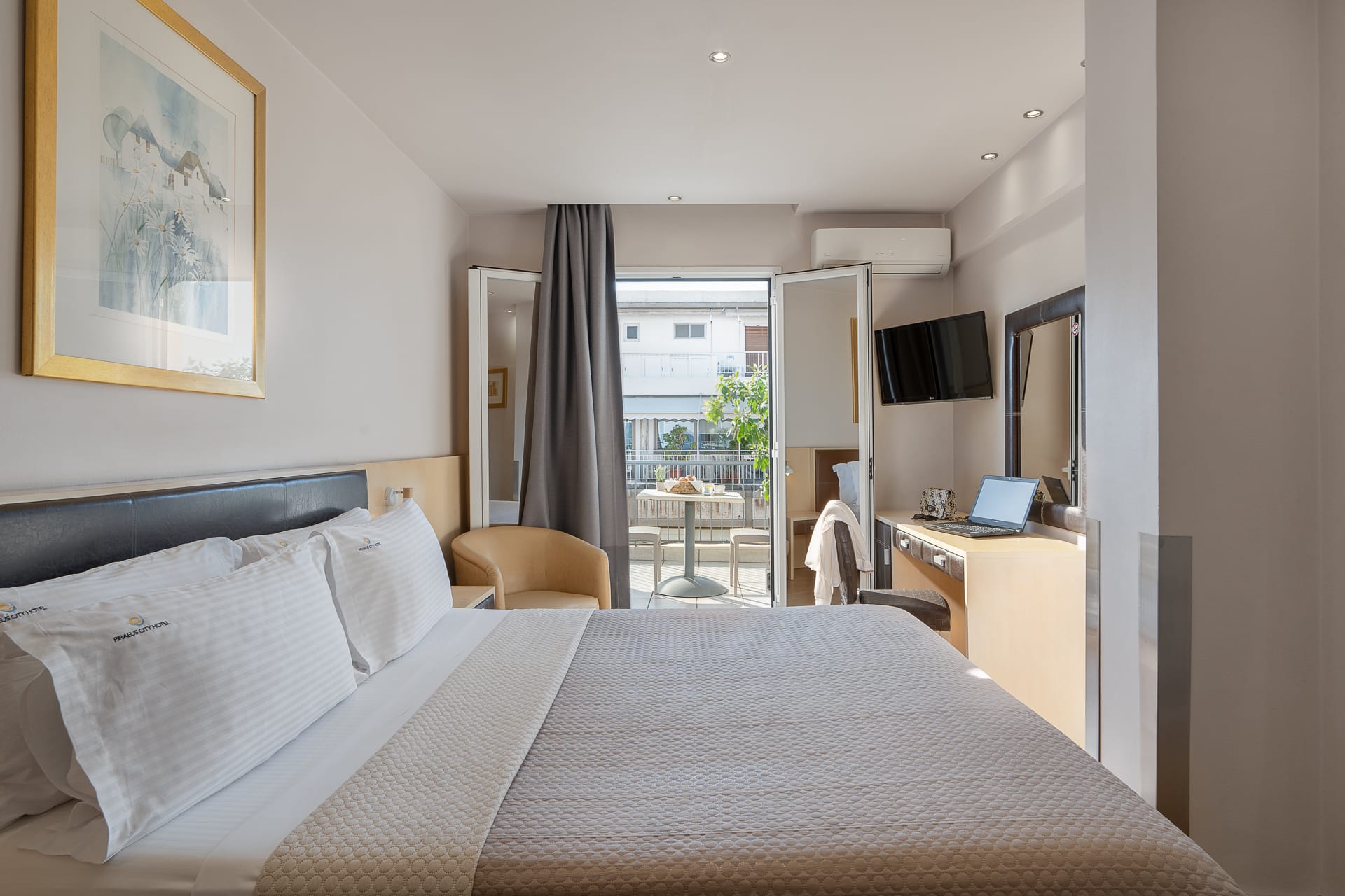 a hotel room with a large glass door