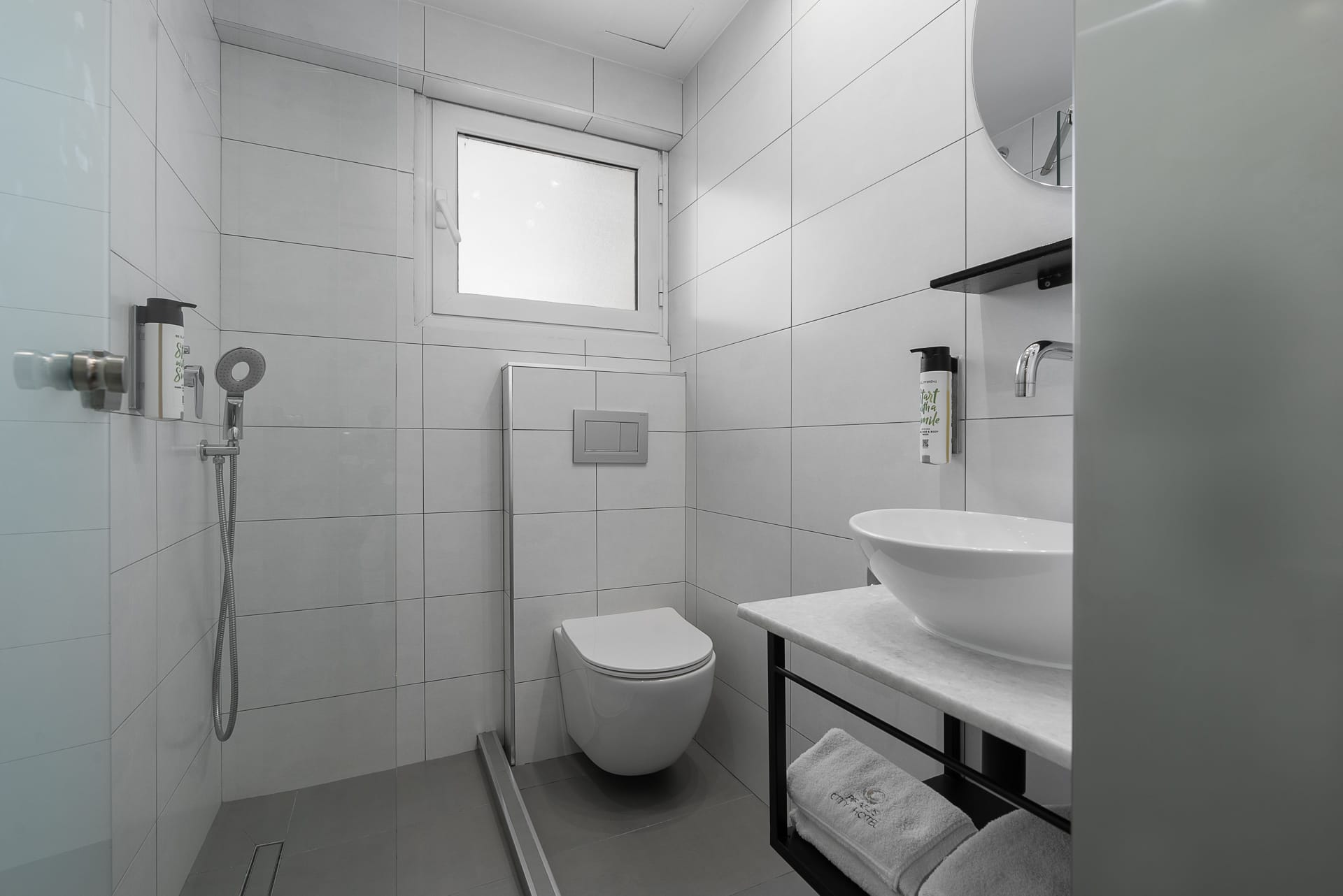 a bathroom with a toilet and sink
