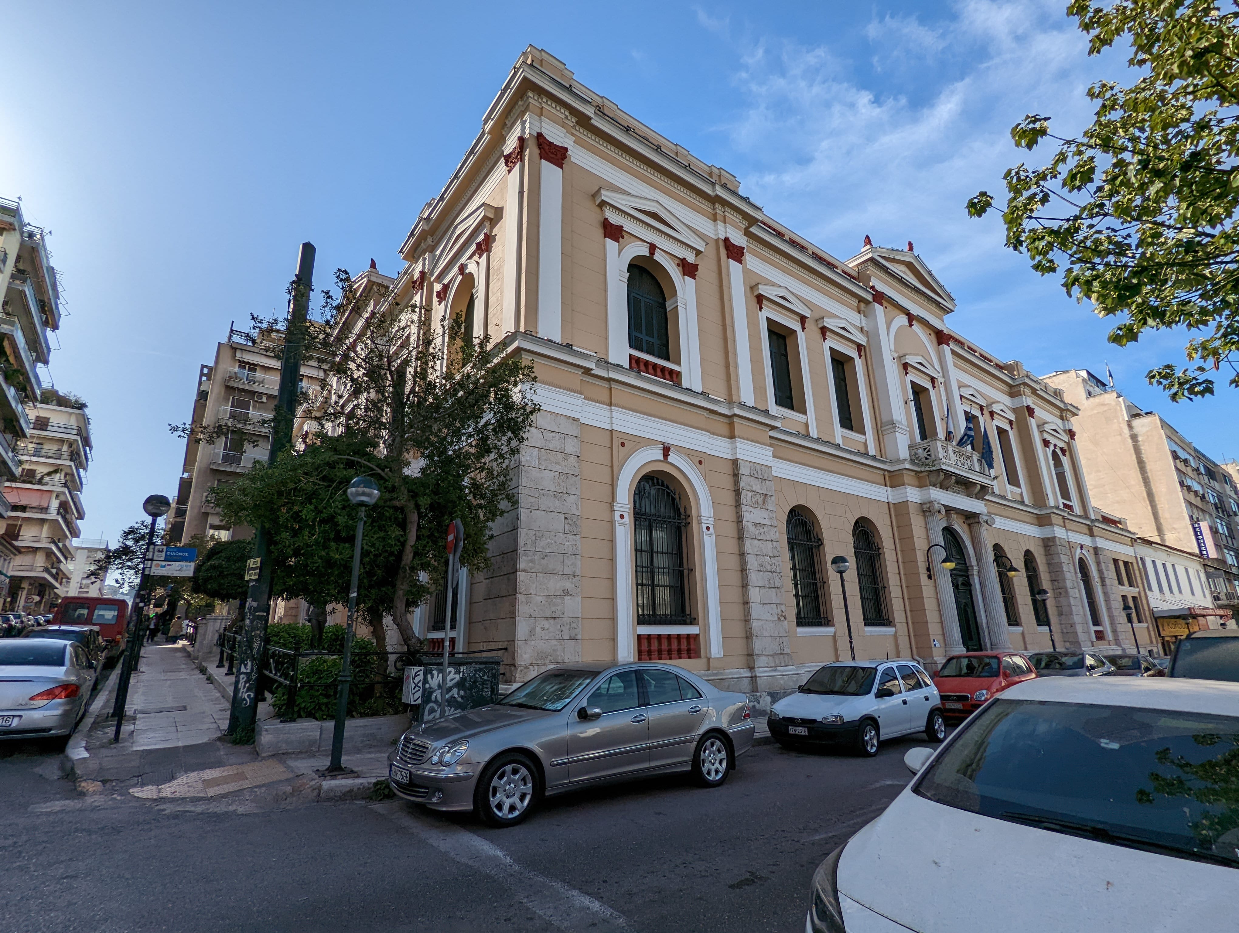 a street with cars parked on the side of it