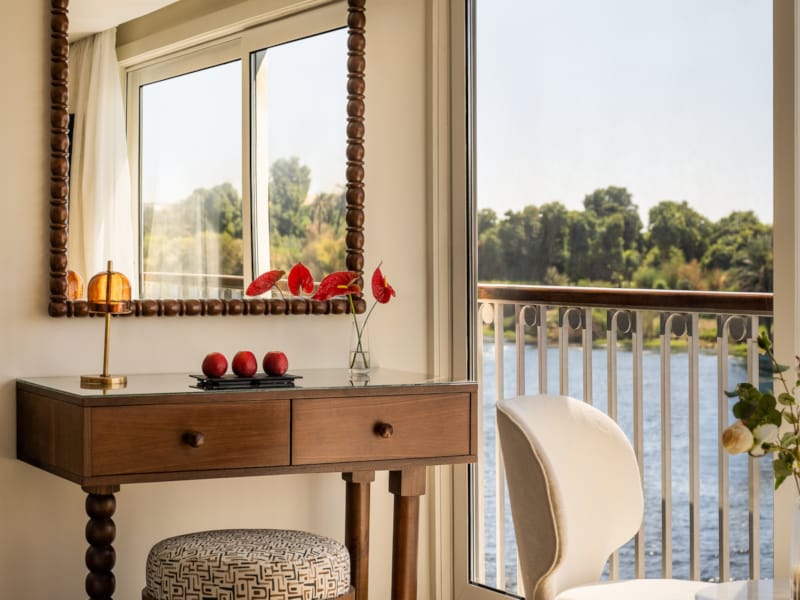 a room with a table and chairs