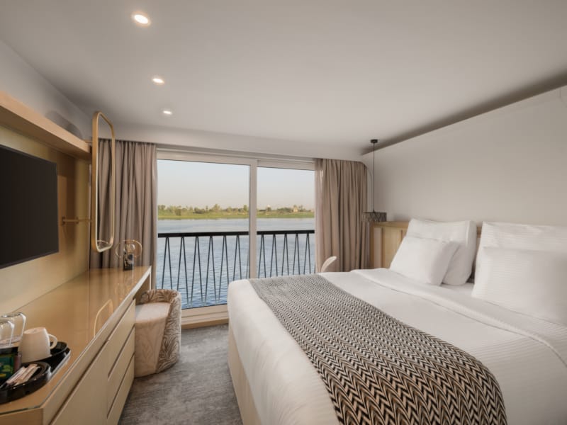 a hotel room with a large window