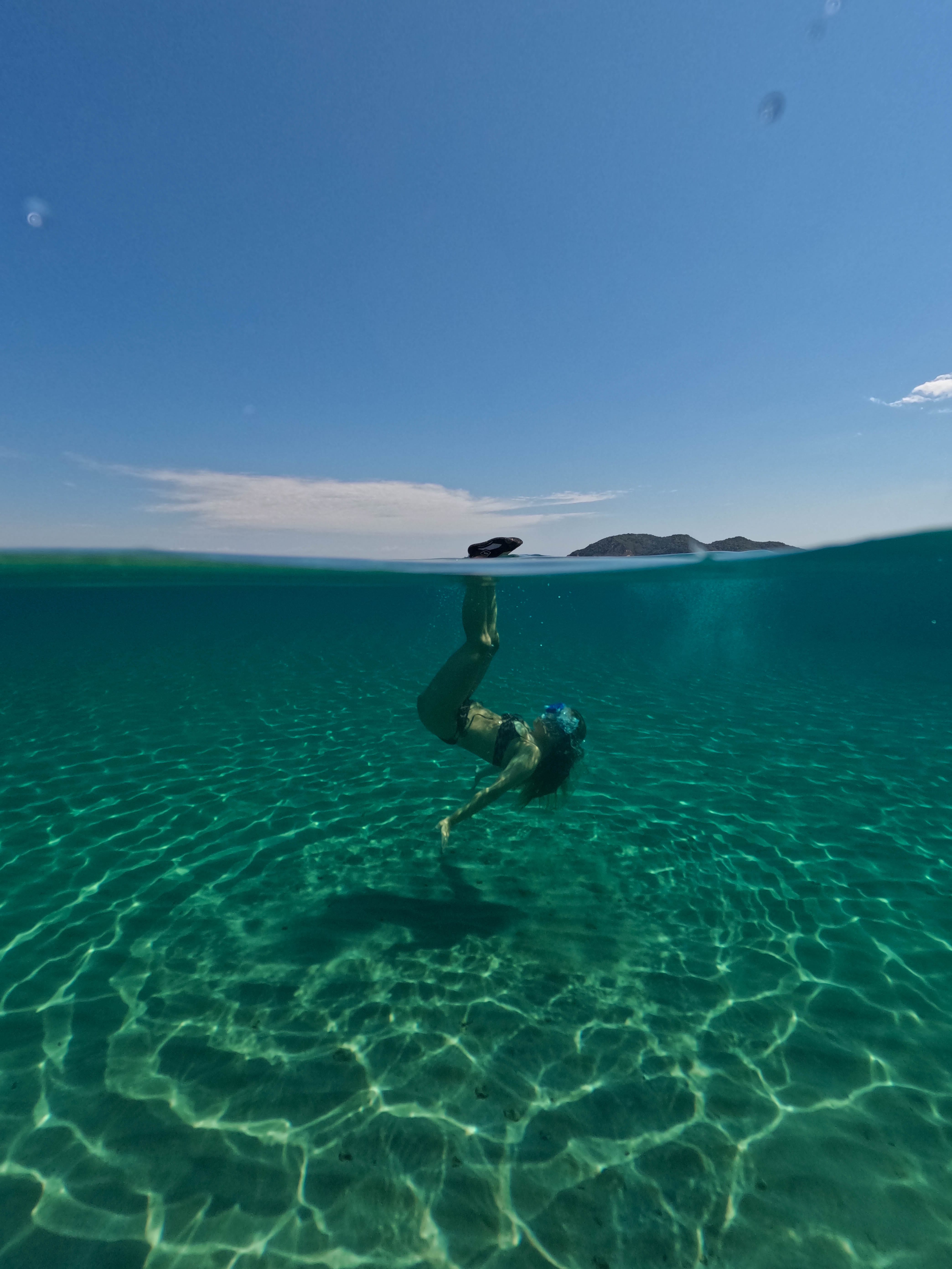 a person swimming in the water
