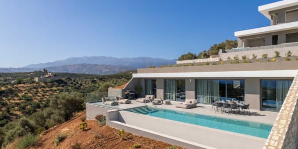 a swimming pool outside a house