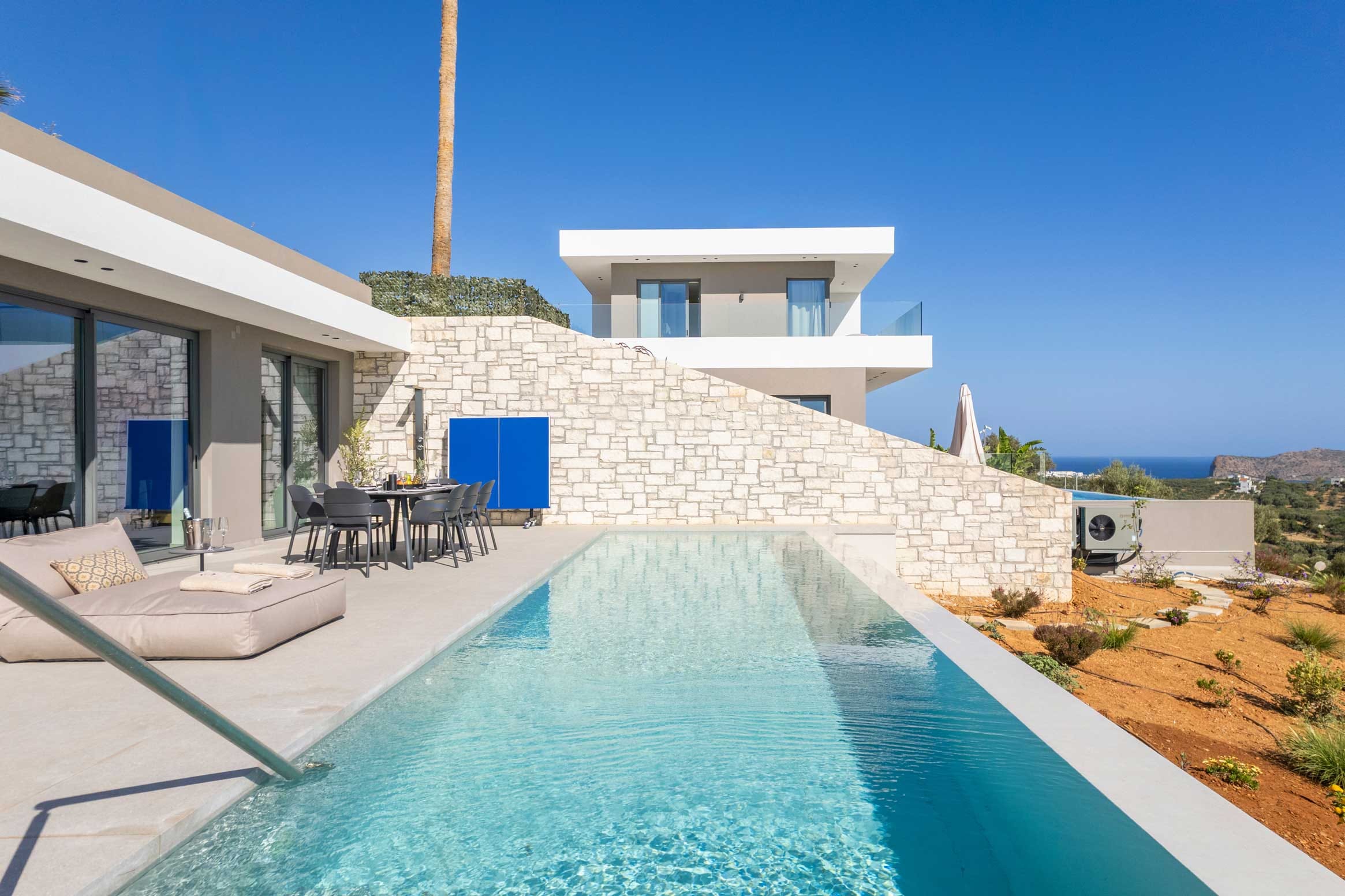 a swimming pool outside of a house