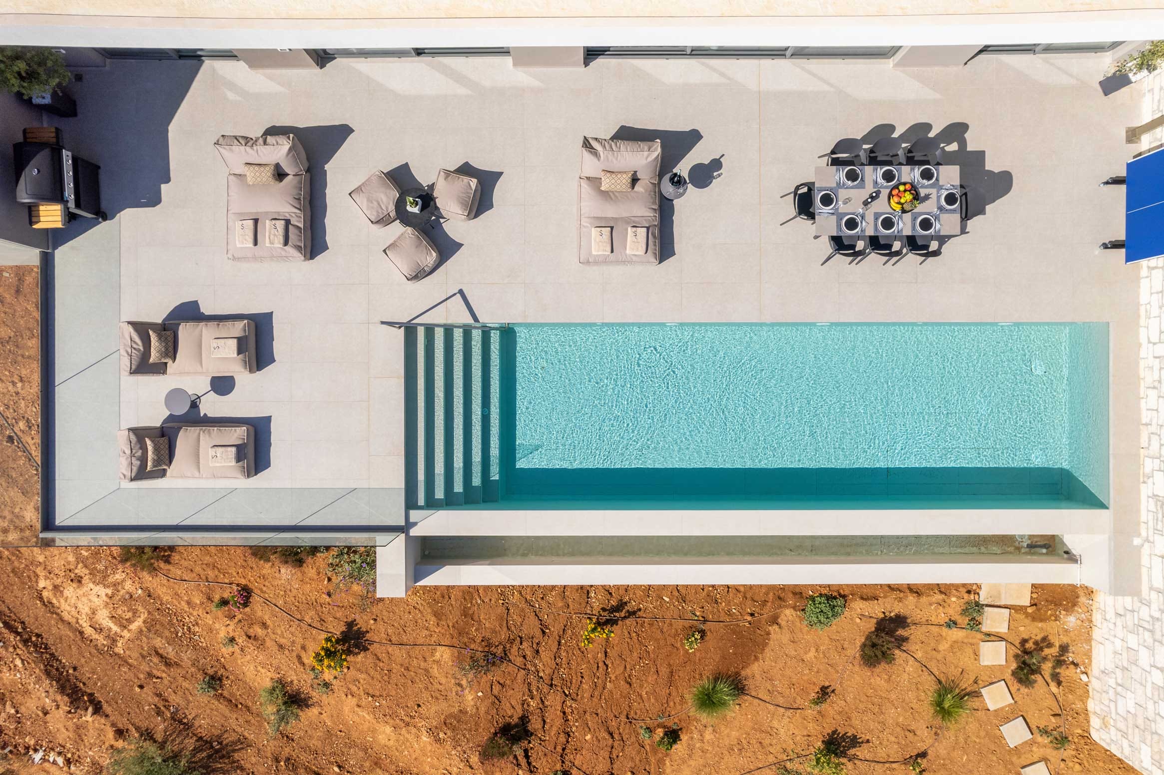 a sign with a building in the background