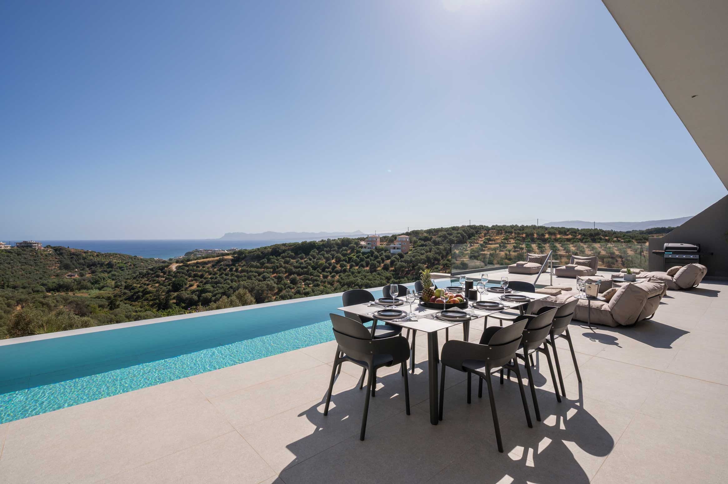 a table and chairs on a deck
