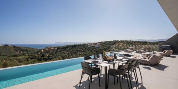 a table and chairs on a deck