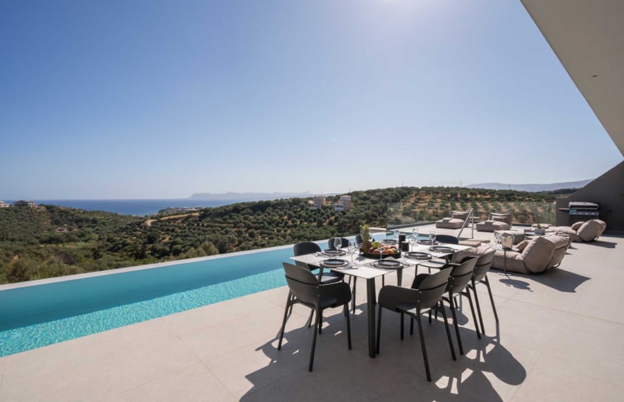 a table and chairs on a deck