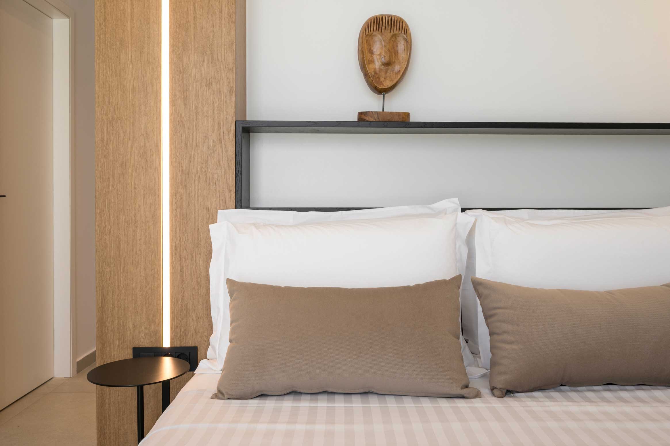 a bed with white sheets