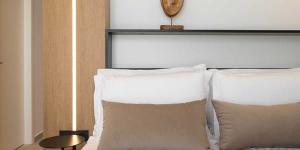 a bed with white sheets