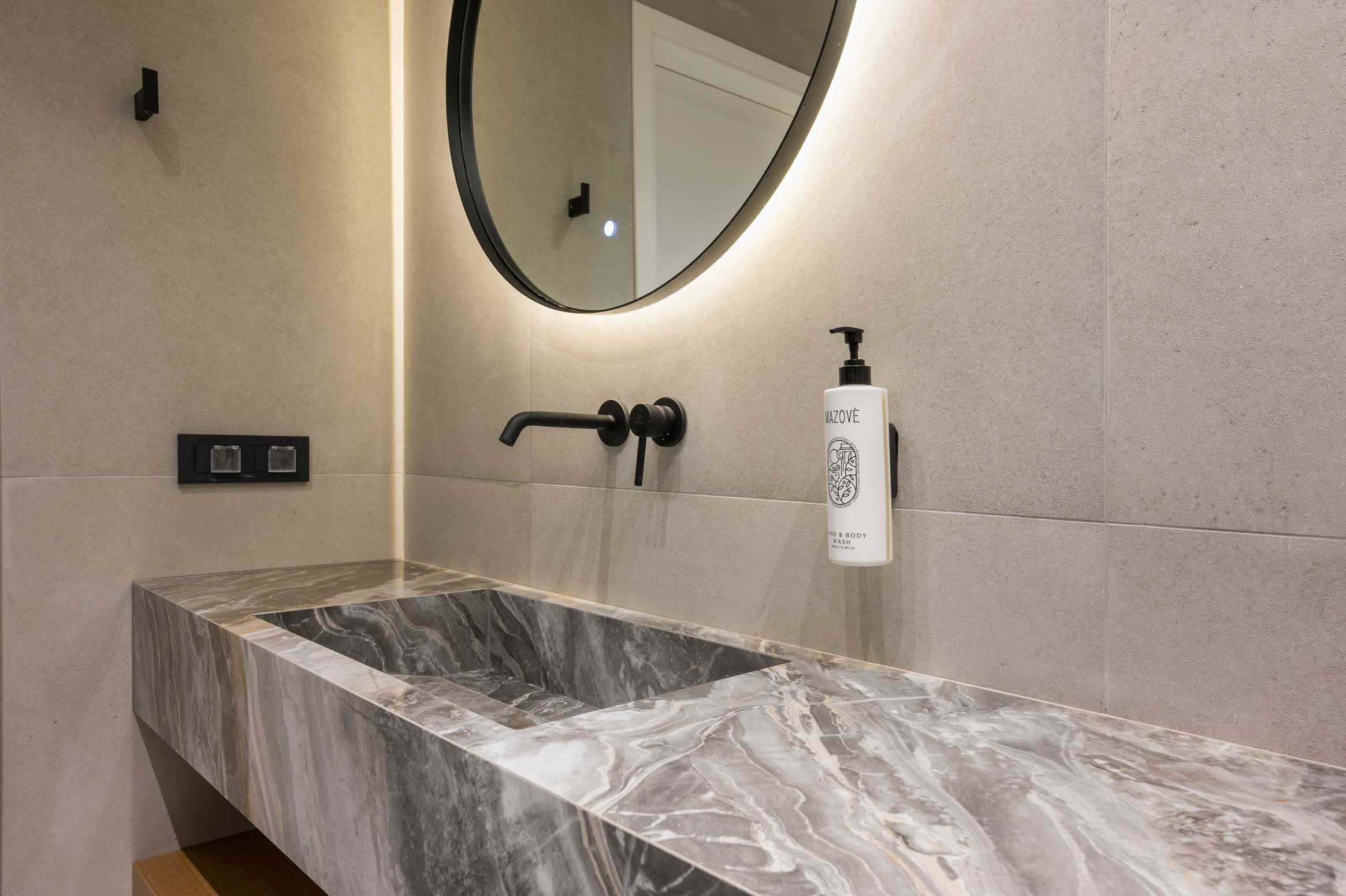a bathroom with a large mirror