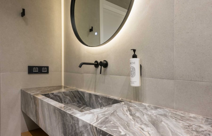 a bathroom with a large mirror