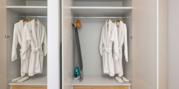 a closet with clothes