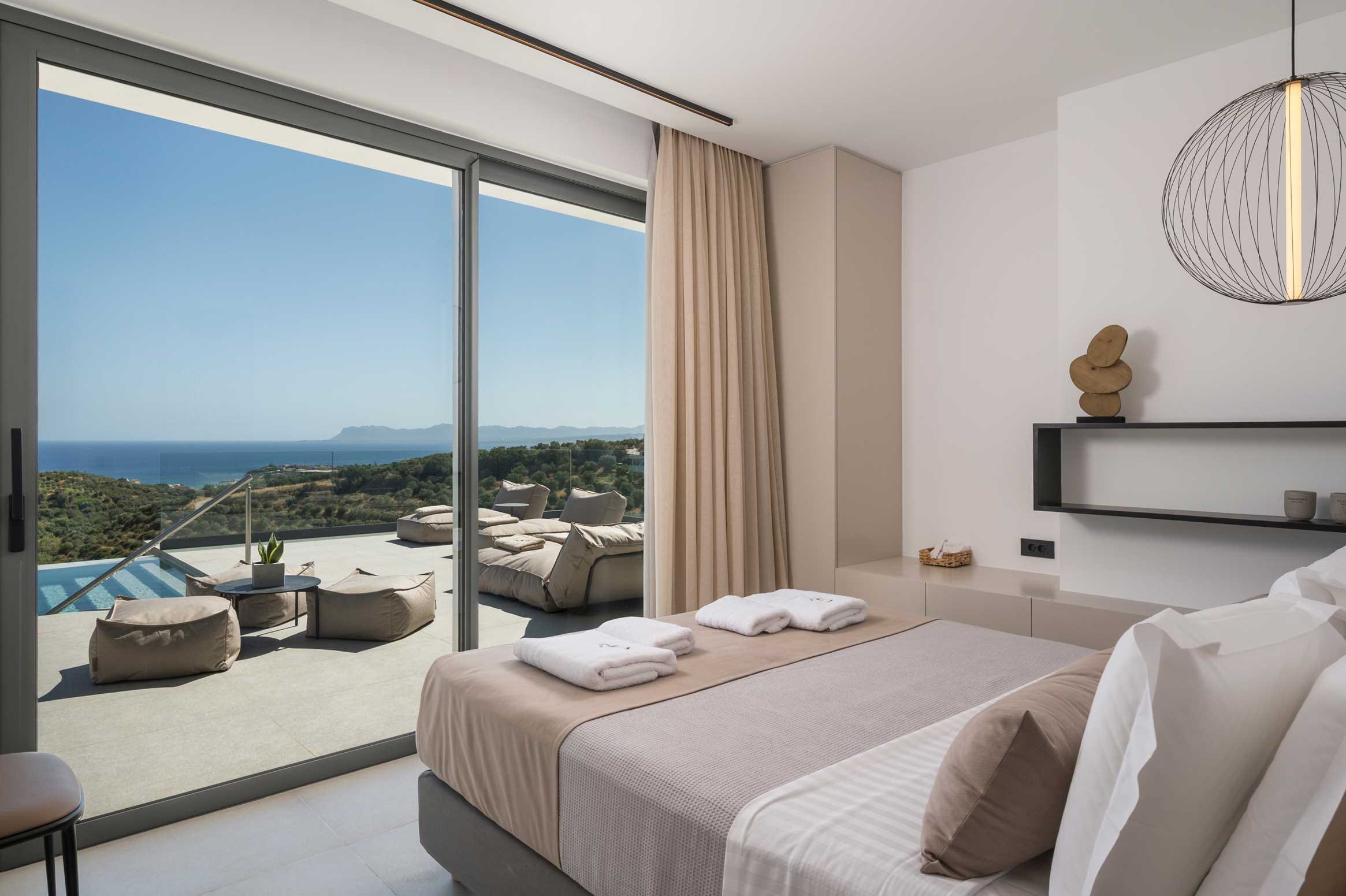 a bedroom with a large window