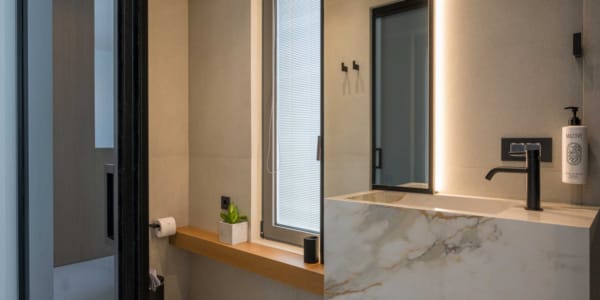 a bathroom with a bathtub and a sink