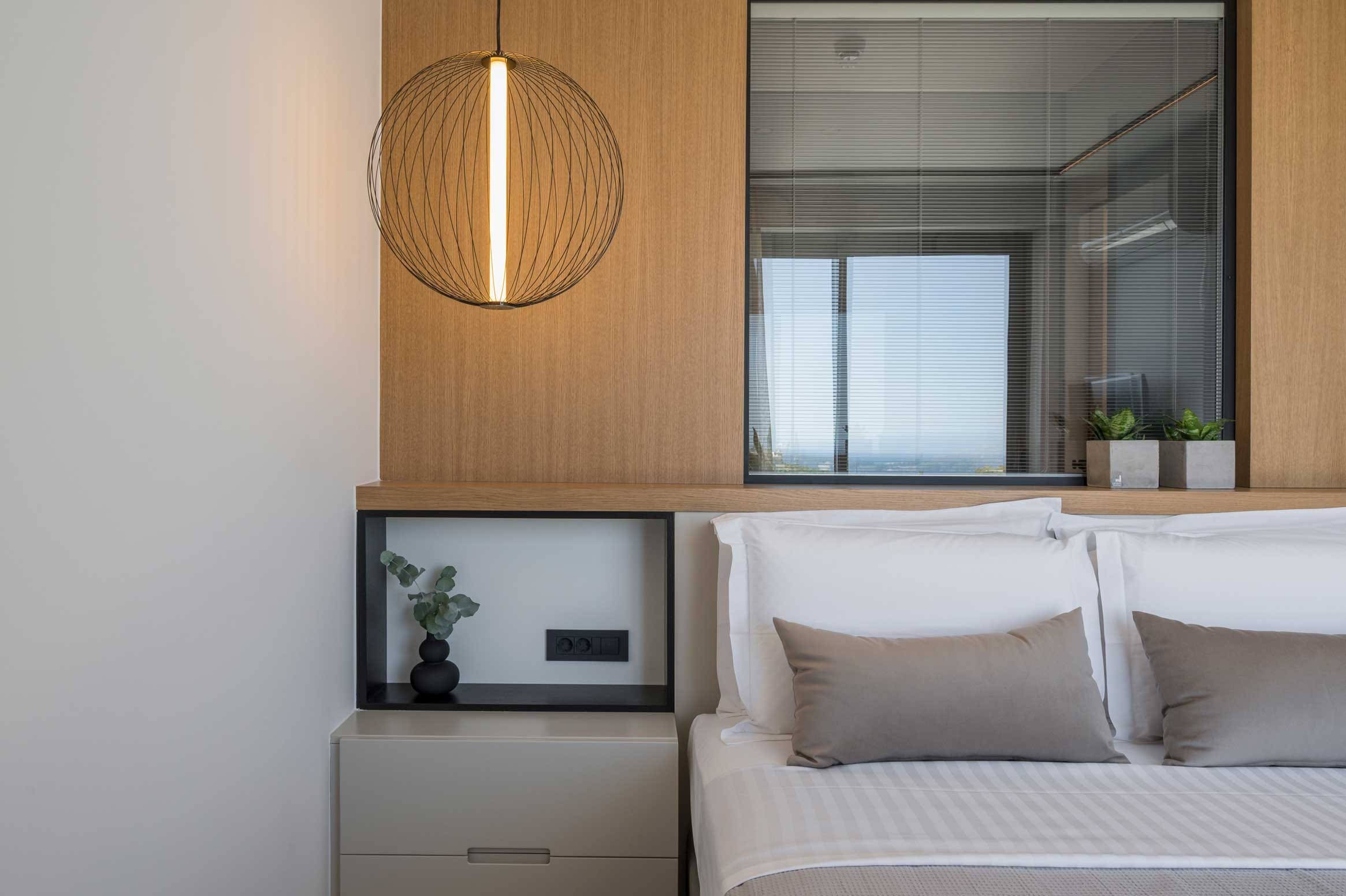 a room with a bed and a window