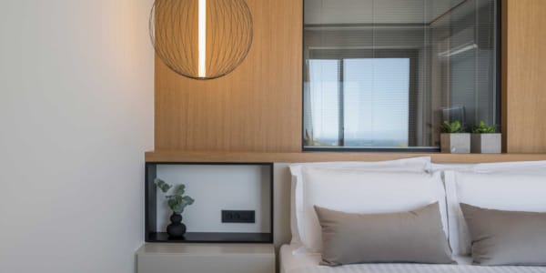 a room with a bed and a window