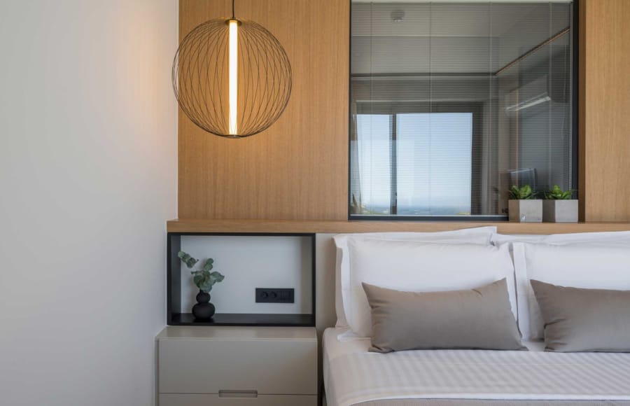 a room with a bed and a window