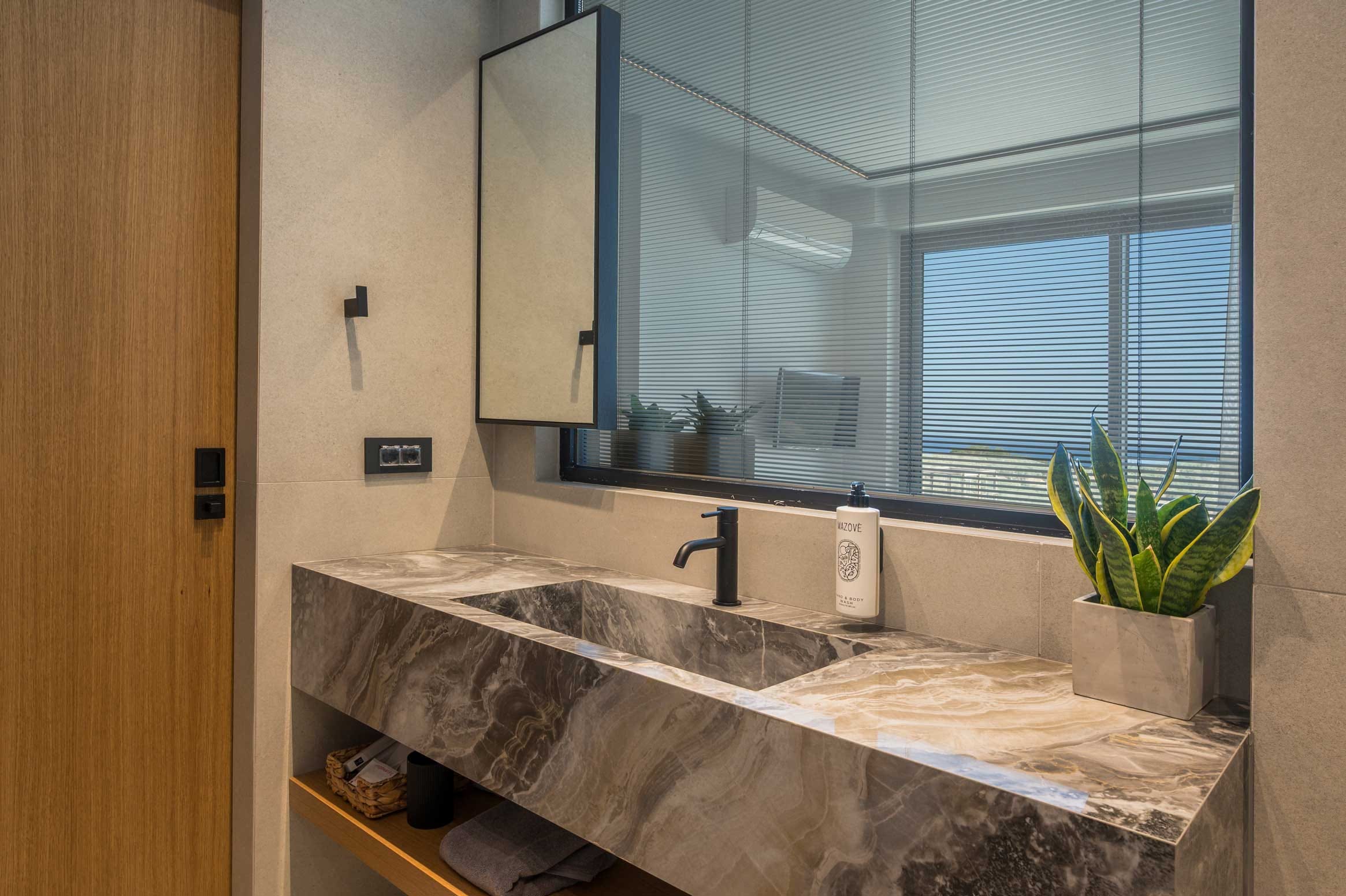 a bathroom with a large mirror