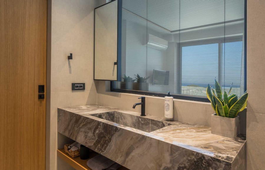 a bathroom with a large mirror