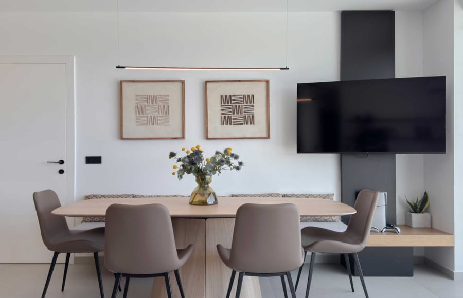 a room with a table and chairs