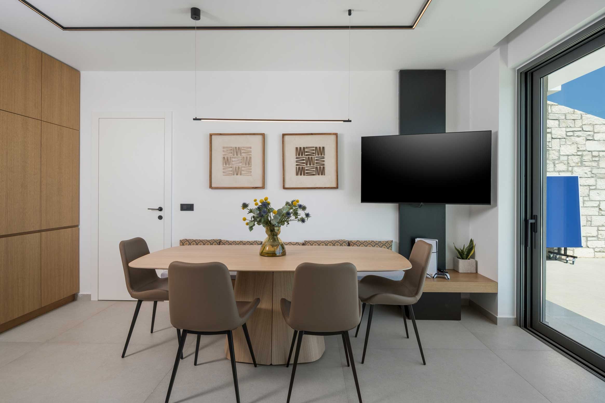 a room with a table and chairs