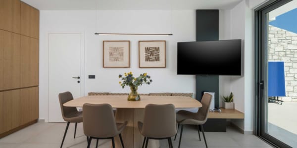 a room with a table and chairs