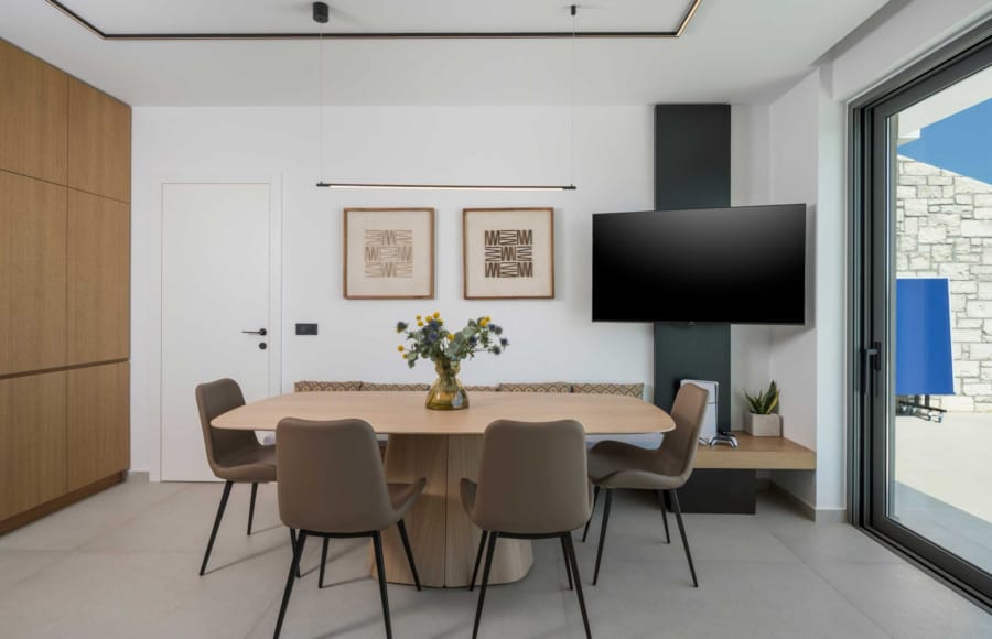 a room with a table and chairs