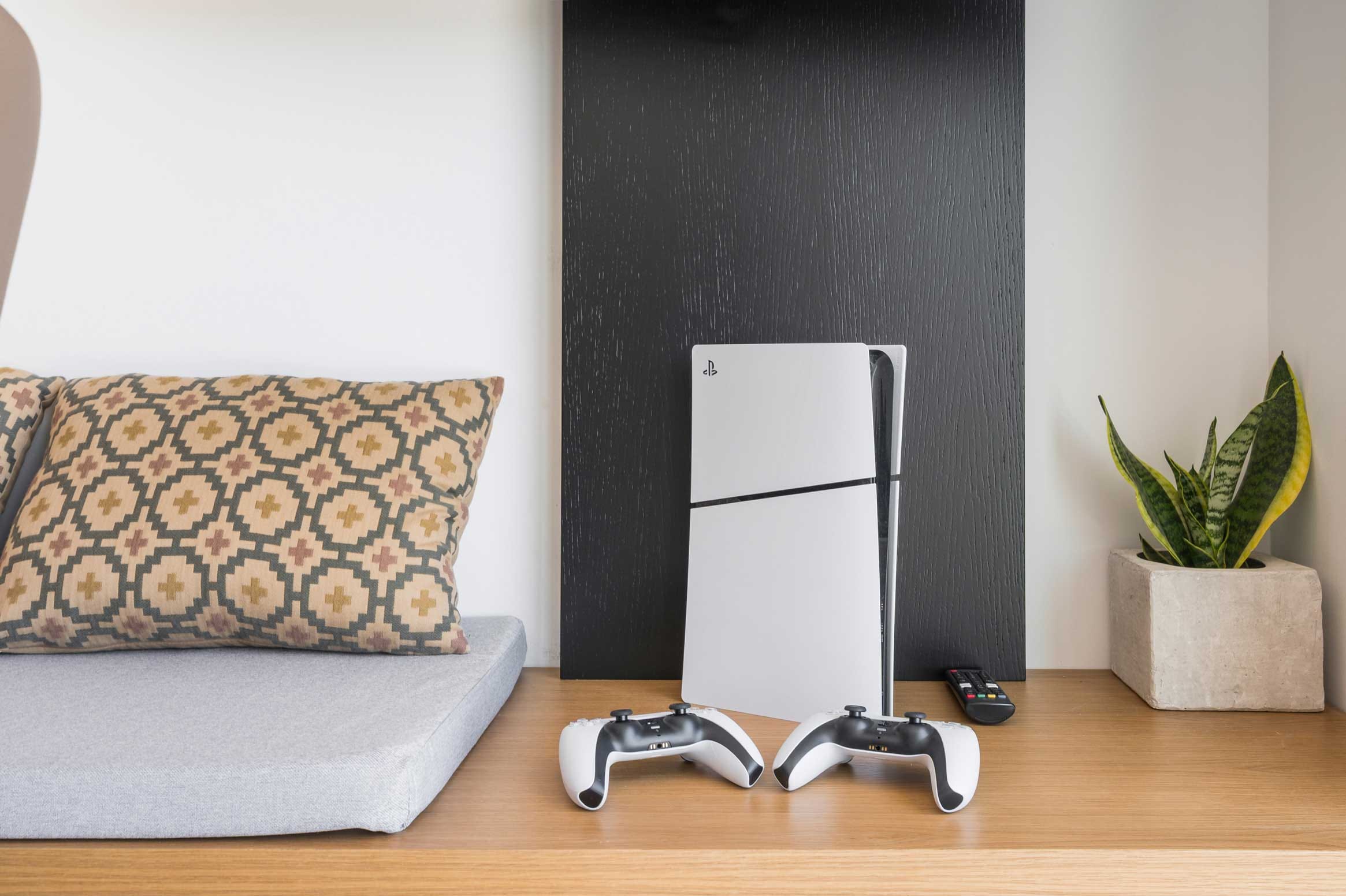 a white refrigerator and a couch