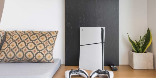 a white refrigerator and a couch