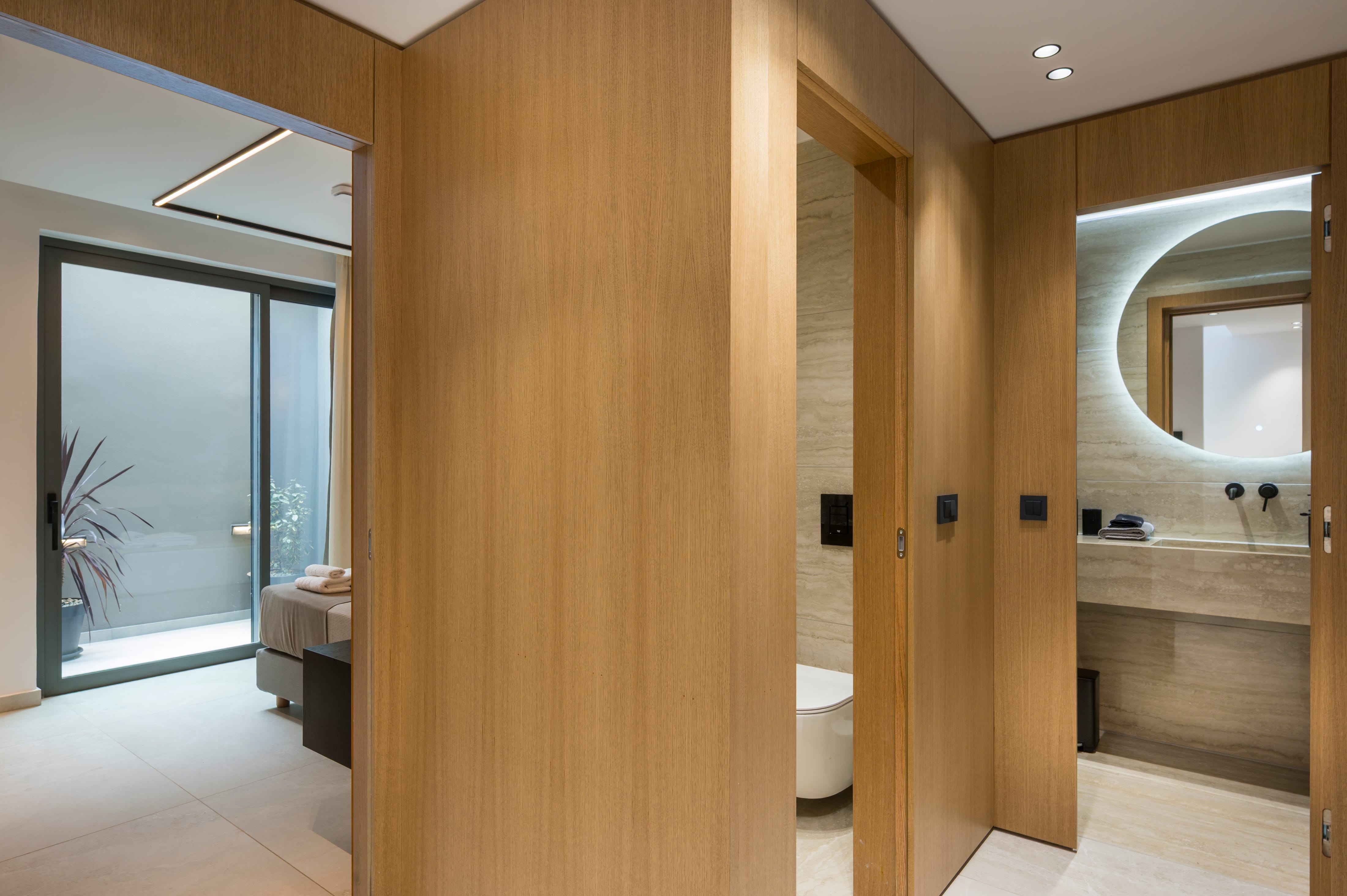 a bathroom with a toilet and a sink