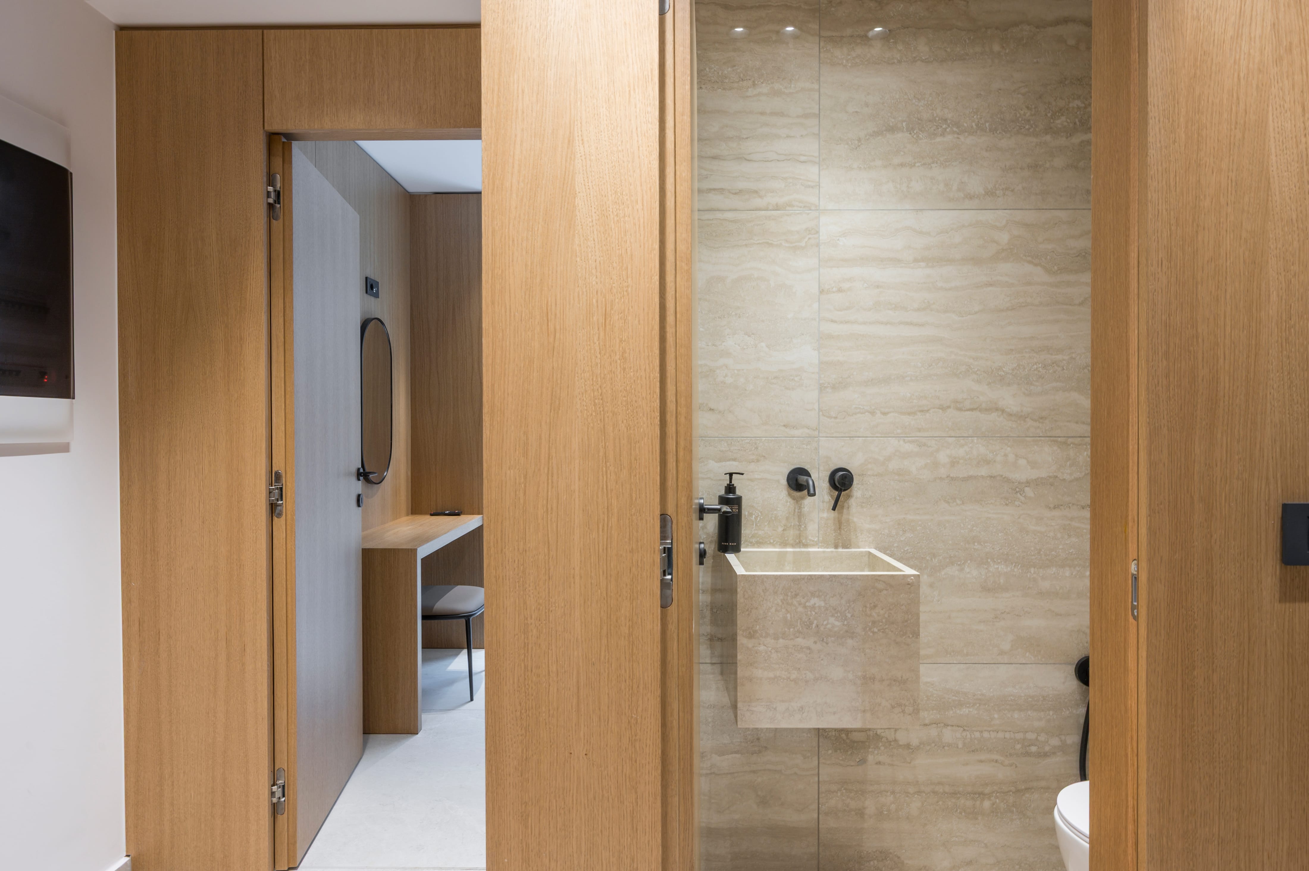 a bathroom with a sink and a toilet
