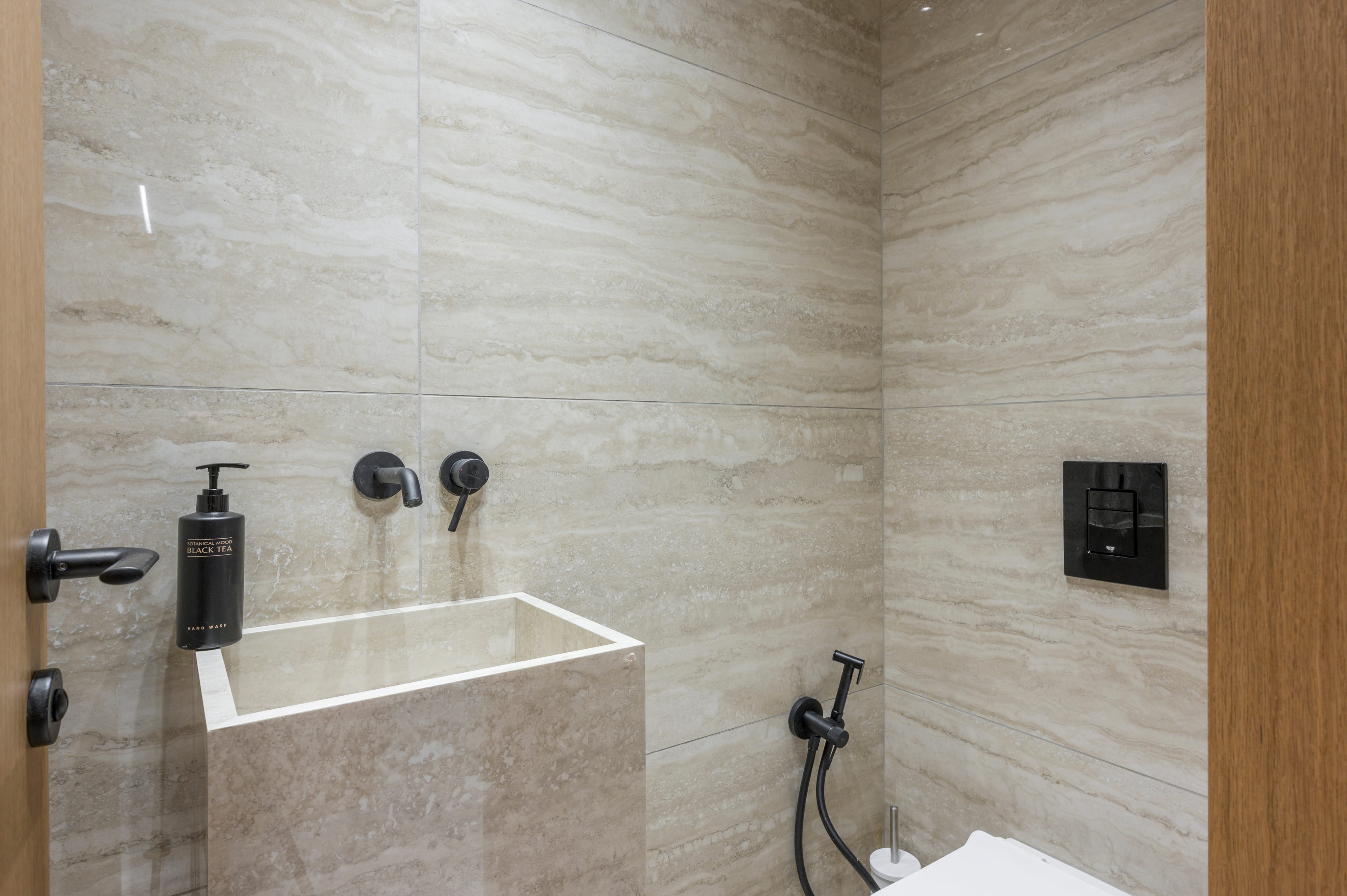a bathroom with a sink and faucet