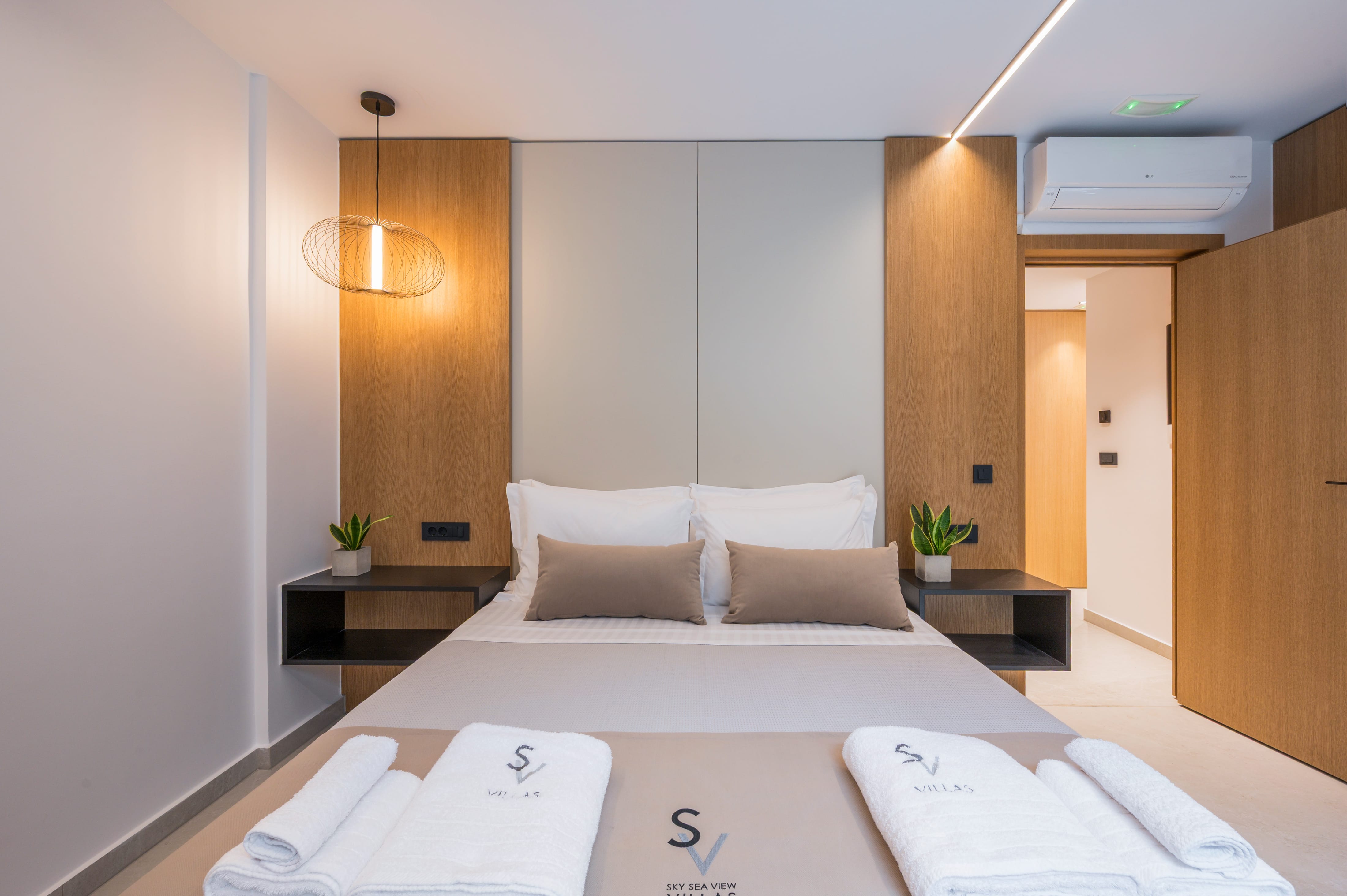a bed with white towels on it