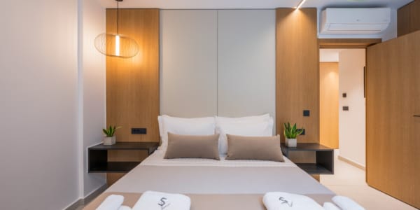 a bed with white towels on it