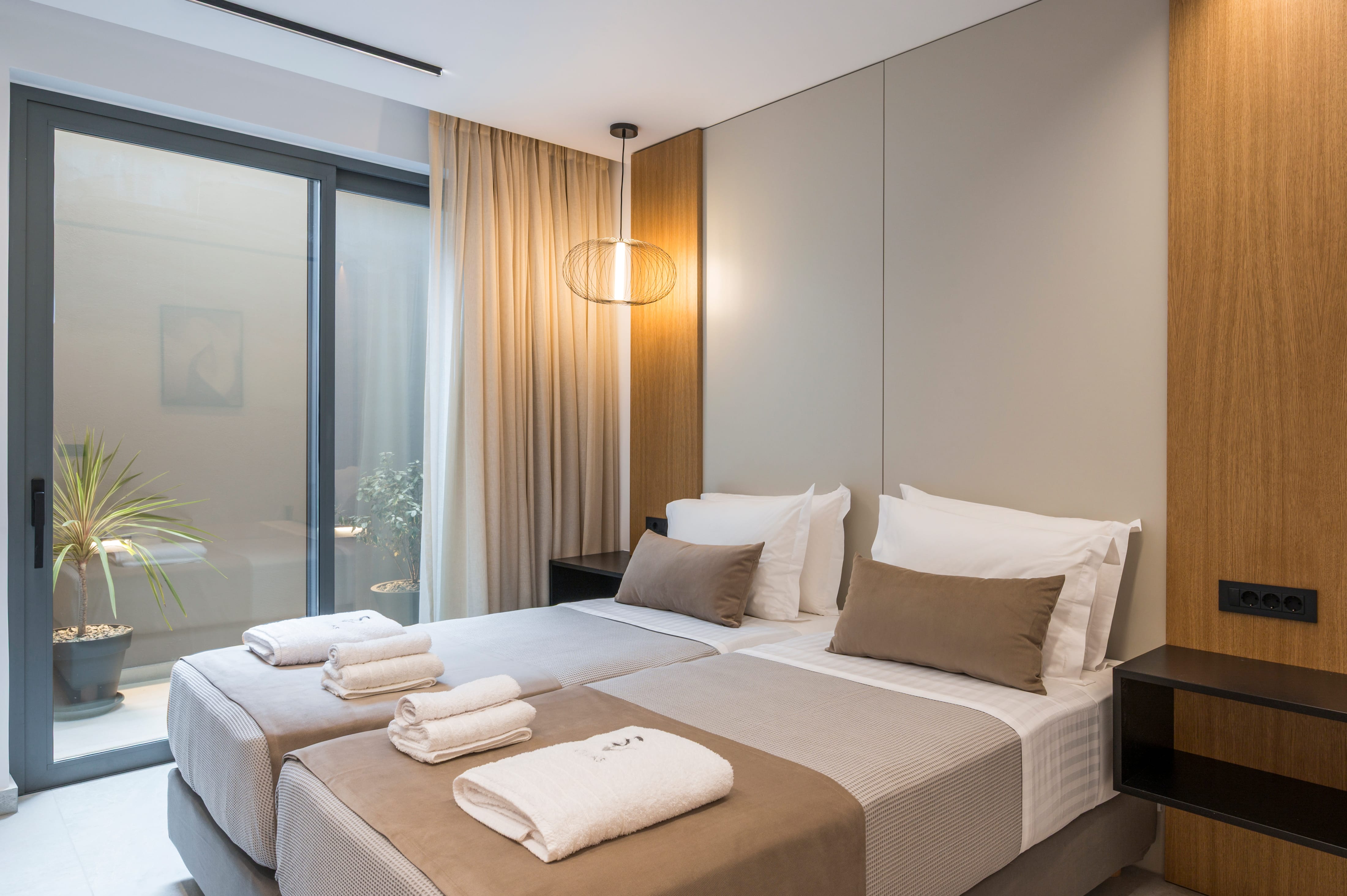 a bed with two beds in a room