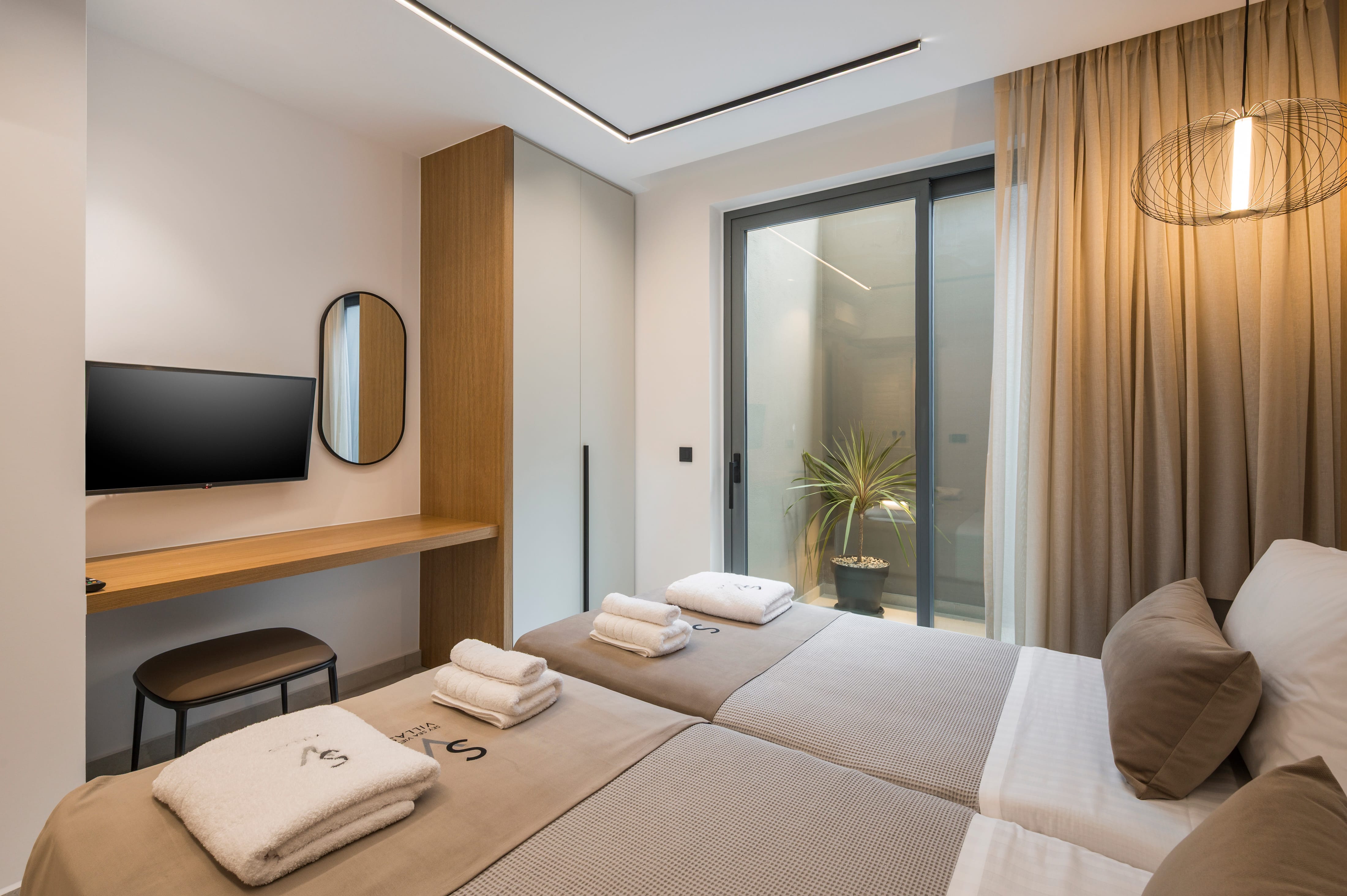 a room with a bed and a tv