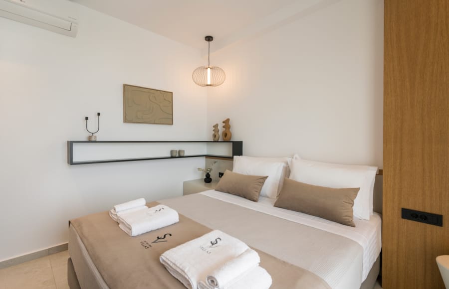 a bed with towels on it