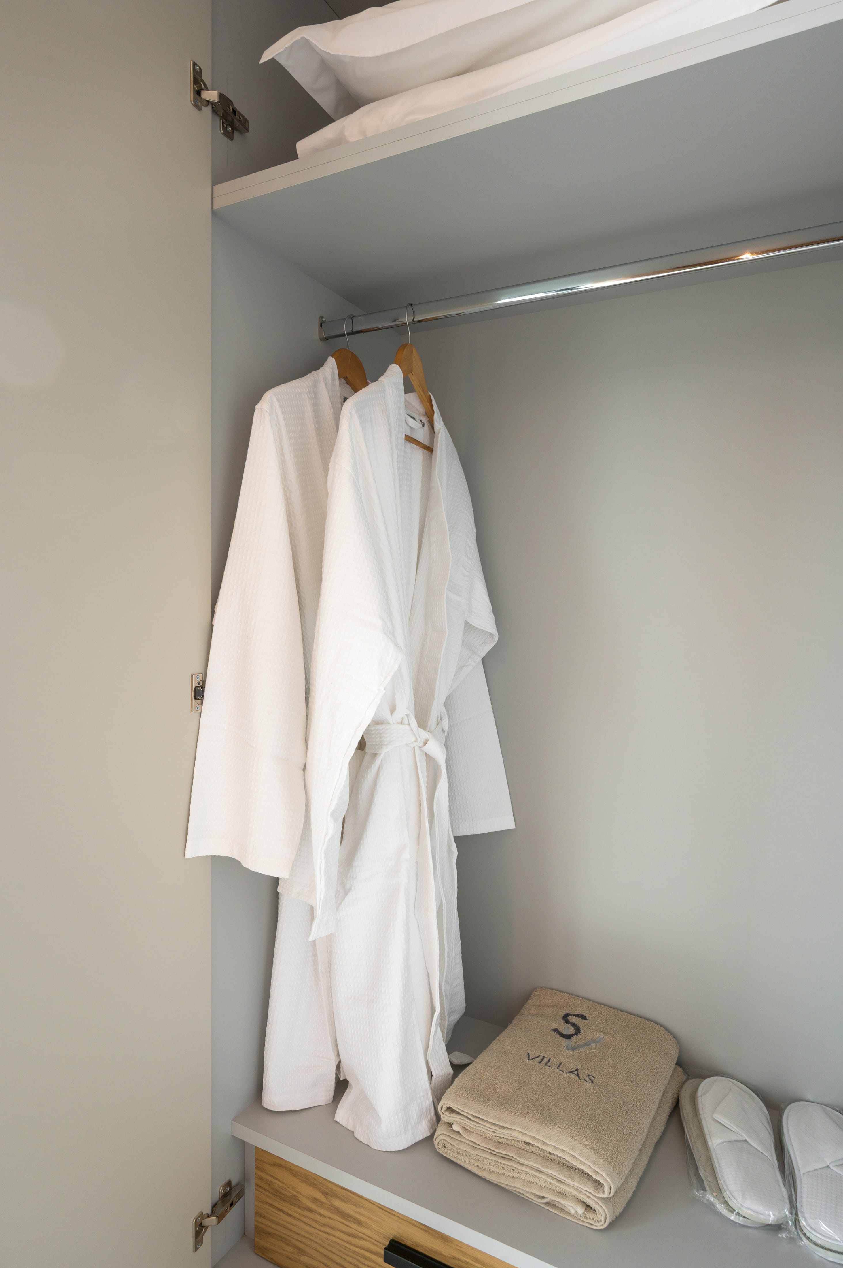 a white robe in a closet