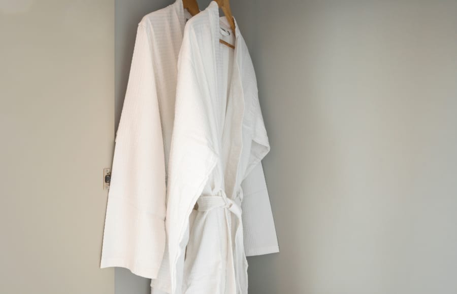 a white robe in a closet