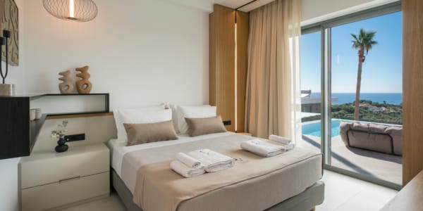 a bedroom with a pool and a bed