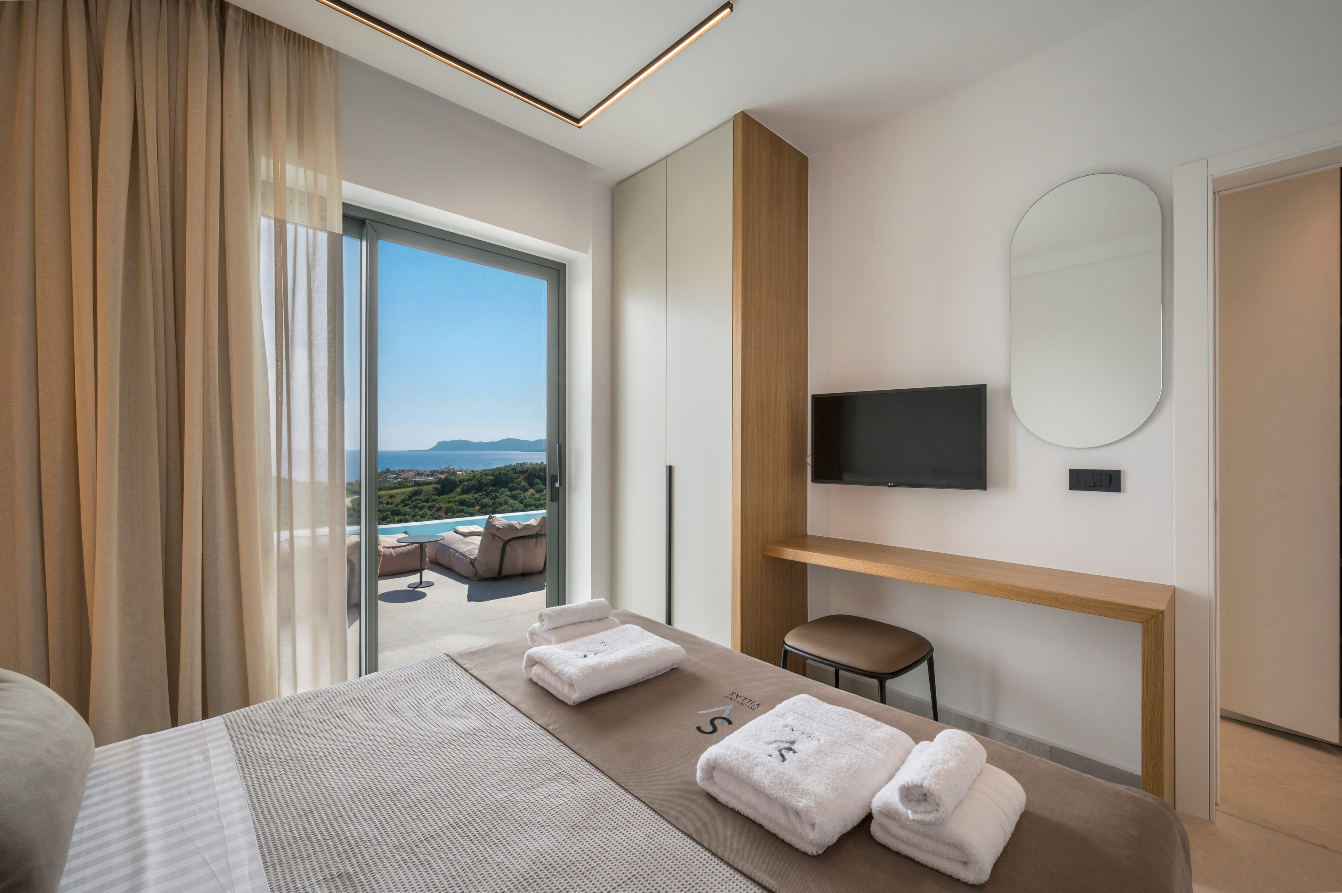 a bedroom with a large window