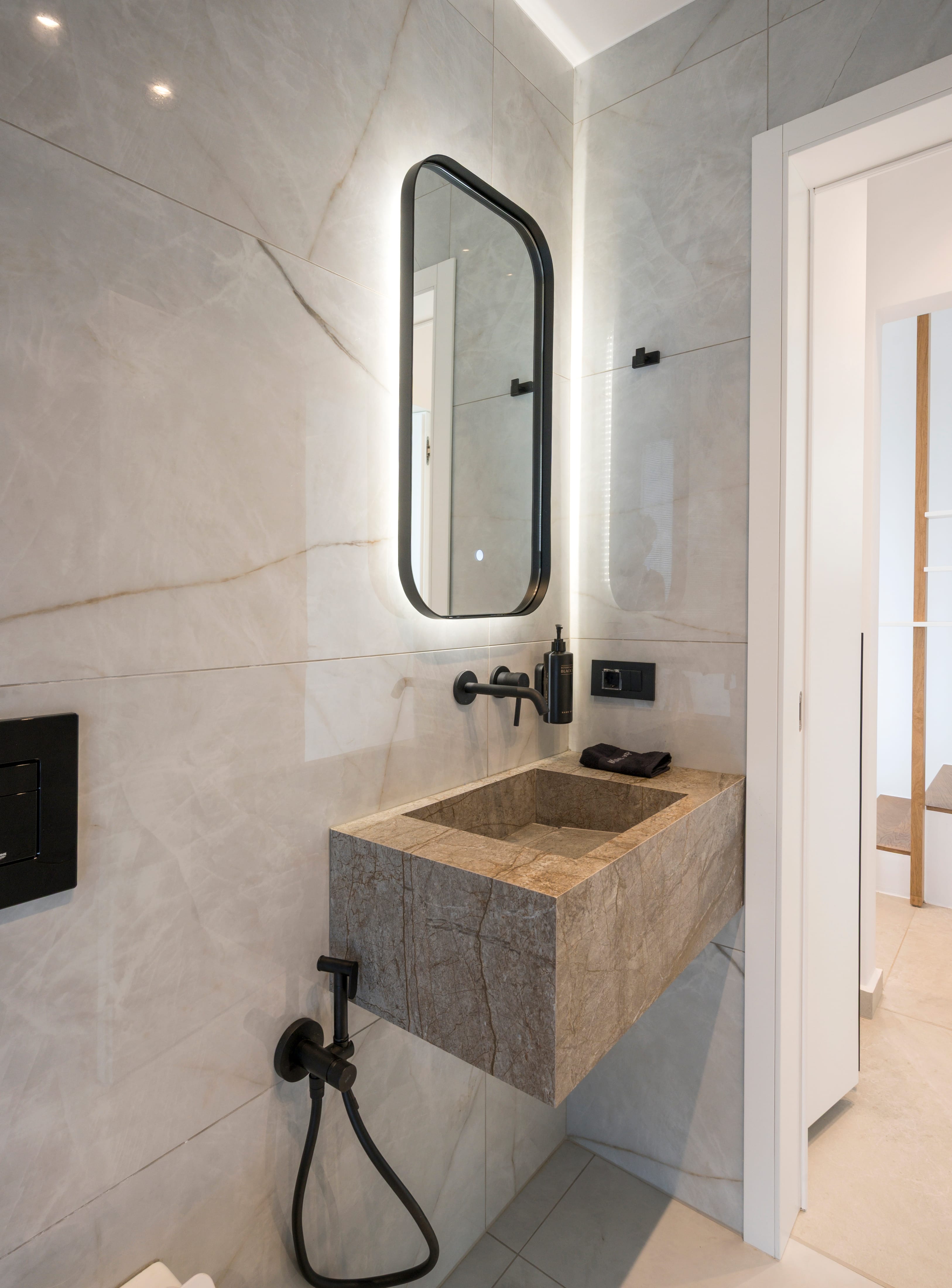 a sink and mirror in a bathroom